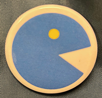 Macaron Pac-man : Symbole d’un employeur récalcitrant, ravageant tout sur son passage